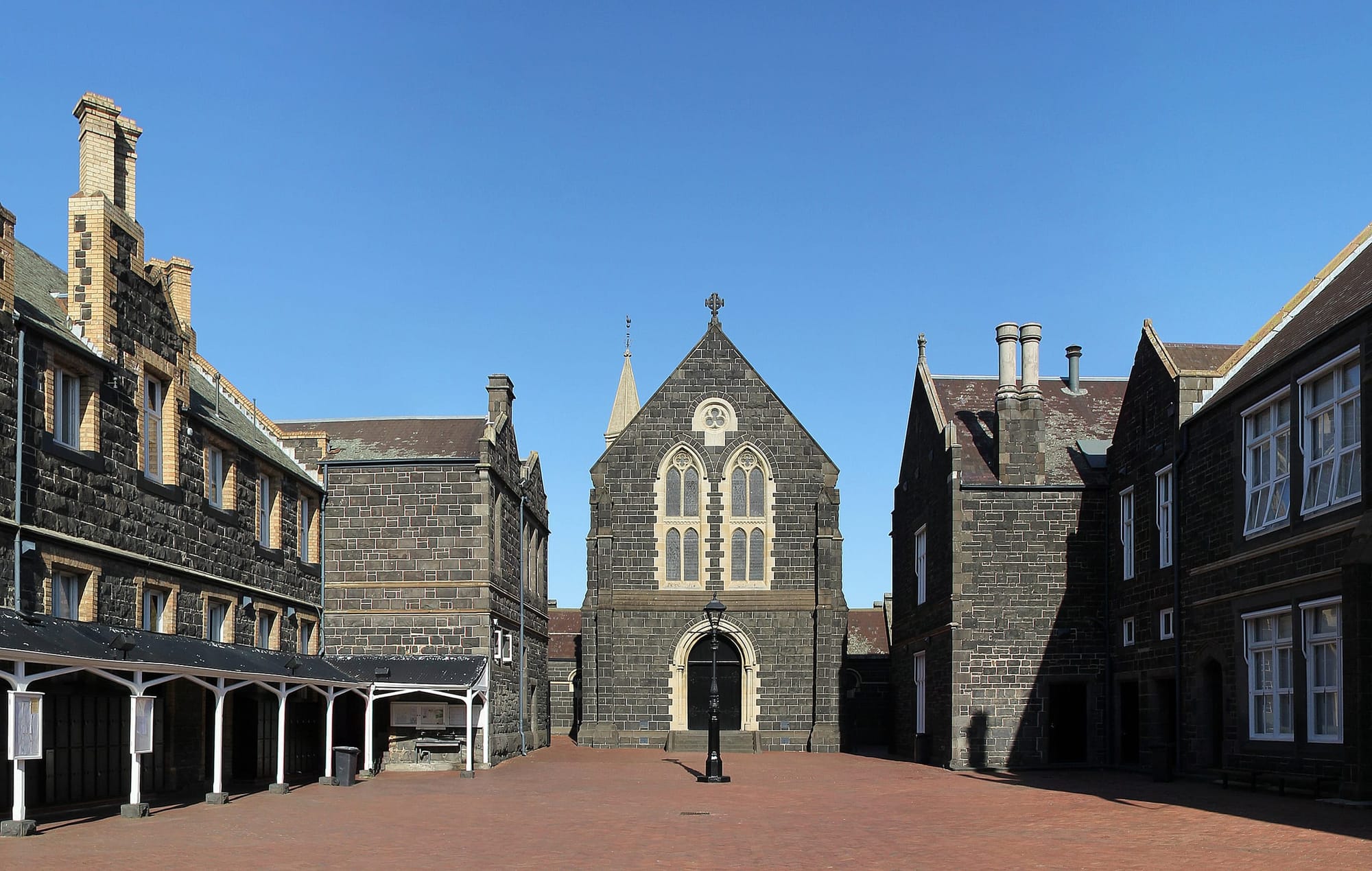 Bluestone chapel tower and surrounding school buildings around Chapel Court